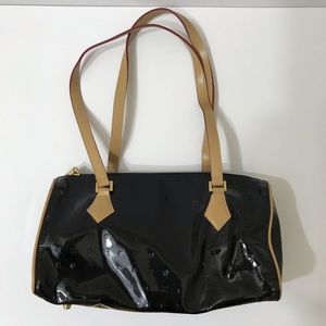 Arcadia black patent barrel bag